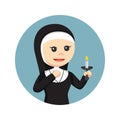 Female nun holding a candle