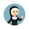 Female nun holding a cross necklace