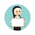 Female nun holding a empty board