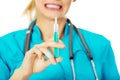 Female nurse or doctor with stethoscope holding syringe Royalty Free Stock Photo