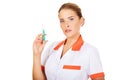 Female nurse or doctor with a syringe in hand Royalty Free Stock Photo