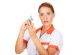 Female nurse or doctor with a syringe in hand Royalty Free Stock Photo