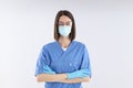 Female nurse in glasess on light background