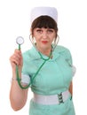 Female nurse holding stethoscope with a white background. Royalty Free Stock Photo