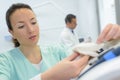 Female nurse preparing injection with syringe in hospital Royalty Free Stock Photo