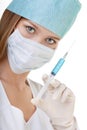 Female Nurse Showing a Syringe with Blue Liquid Royalty Free Stock Photo