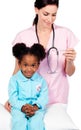 Female nurse taking little girl's temperature Royalty Free Stock Photo