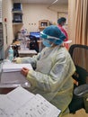 Female nurse wearing Personal protective equipment PPE in the hospital to fight against Coronavirus disease