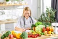Female nutritionist young doctor writing diet plan on table. Right nutrition and slimming concept Royalty Free Stock Photo