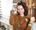 Female offering to buy necklace and bracelets