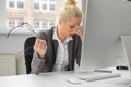 Female at the office resting eyes Royalty Free Stock Photo