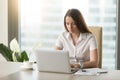 Female office worker doing everyday work routine Royalty Free Stock Photo