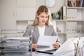 Female office worker doing paperwork Royalty Free Stock Photo