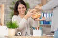 female office worker gettting meal delivered at work Royalty Free Stock Photo