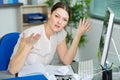 female office worker making questioning gesture incomprehension