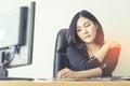 Female office worker suffering injury on shoulder from long hour of work Royalty Free Stock Photo