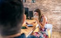 Office worker talking mobile phone with speaker Royalty Free Stock Photo