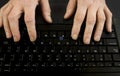 female old hands on keyboard close up. View from above. Royalty Free Stock Photo