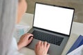 Female older businesswoman typing on laptop computer keyboard with empty screen. Royalty Free Stock Photo