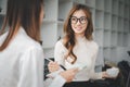 Female operations manager holds meeting presentation for a team of economists.