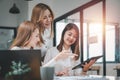 Female operations manager holds meeting presentation for a team of economists