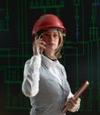 Female operator make call in power distribution control center