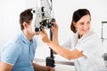 Female Optometrist Doing Sight Testing For Patient Royalty Free Stock Photo
