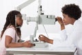 Female Optometrist Examining Patient Royalty Free Stock Photo