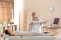 Female orthopedist examining patient`s leg Royalty Free Stock Photo