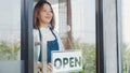 Female owner of coffee shop opening the service after lockdown quarantine Royalty Free Stock Photo