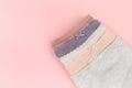 Female panties over pink  background - Image Royalty Free Stock Photo
