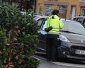 FEMALE PARKING INSPECTOR PARKING FINE Royalty Free Stock Photo