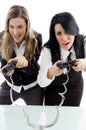 Female partners playing game and holding remote
