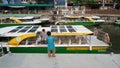 Female passenger gets out of a canal boat