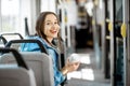 Female passenger using public transport Royalty Free Stock Photo