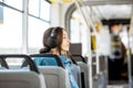 Female passenger using public transport Royalty Free Stock Photo