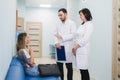 Female Patient Being Reassured By Doctor In Hospital Room Royalty Free Stock Photo