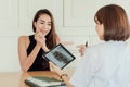 A female patient in a glad moment after knowing the good news of treatment Royalty Free Stock Photo