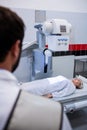 Female patient going through x-ray test