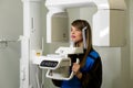 Female patient having computer tomography of jaw Royalty Free Stock Photo