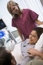 Female patient having eggs retrieved using ultraso Royalty Free Stock Photo