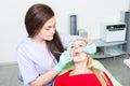 Female patient with open mouth at dentist Royalty Free Stock Photo