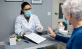 Patient refusing the coronavirus vaccine offered by doctor Royalty Free Stock Photo