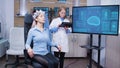 Female patient sitting on a chair with brainwaves sensors