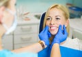 Female patient in dentist office for dental exam Royalty Free Stock Photo