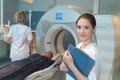 Female patient undergoing ct scan test in examination room Royalty Free Stock Photo