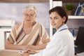 Female pensioner at doctors office