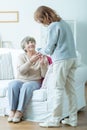 Female pensioner and her carer Royalty Free Stock Photo