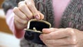 Female pensioner holding empty wallet, retirement poverty, high utility rates