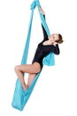 Female performer hanging on aerial silk Royalty Free Stock Photo